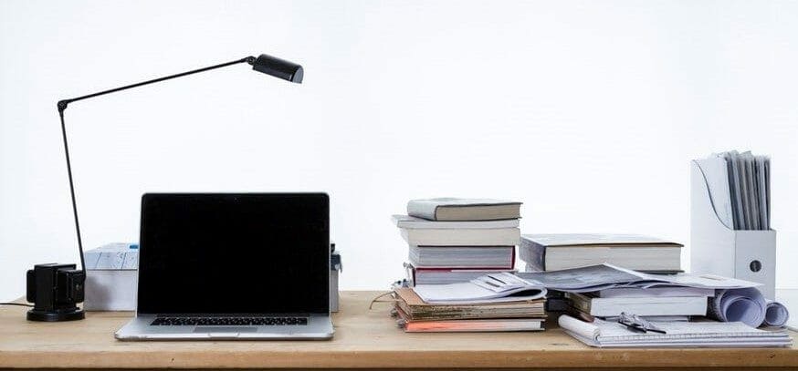 laptop and books