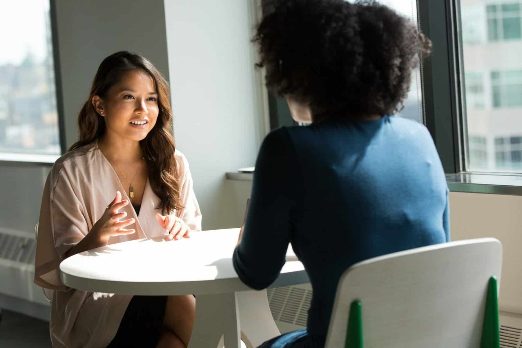 Women of Colour chatting